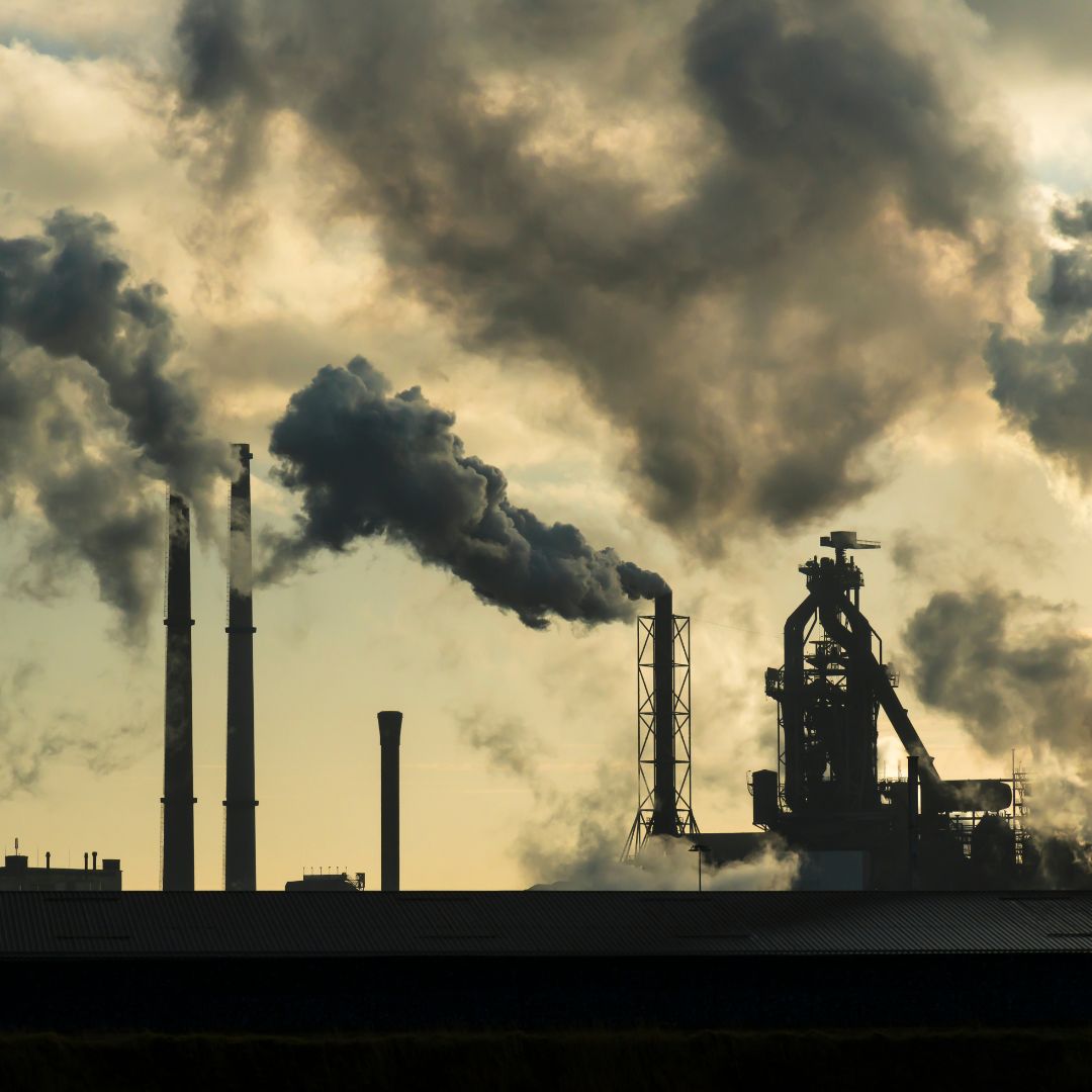 Pull Quote on EPA Endangerment Finding Repeal (1) sepia toned photo of polluting smoke stacks meant to show what the repeal of federal regulation and standards like the endangerment finding will bring to Indiana communities where Hoosiers will experience public health effects like asthma and contaminated water